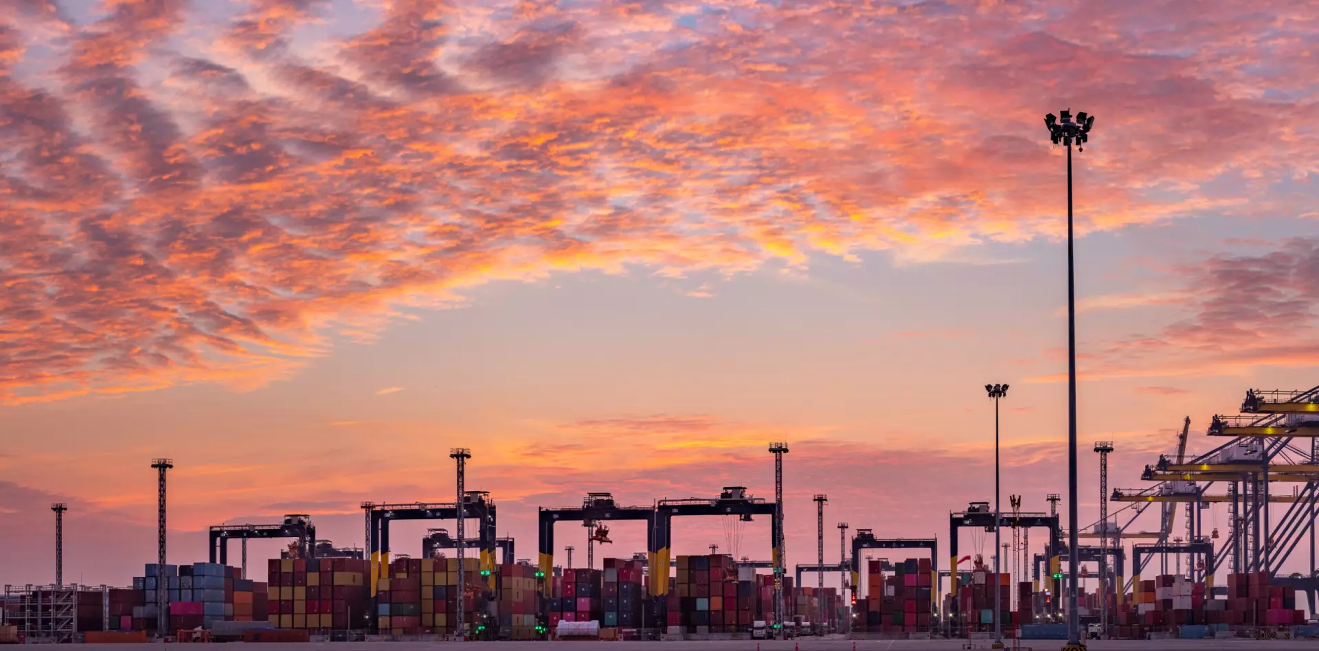 Blog header with a container terminal – explore the latest in freight and logistics news