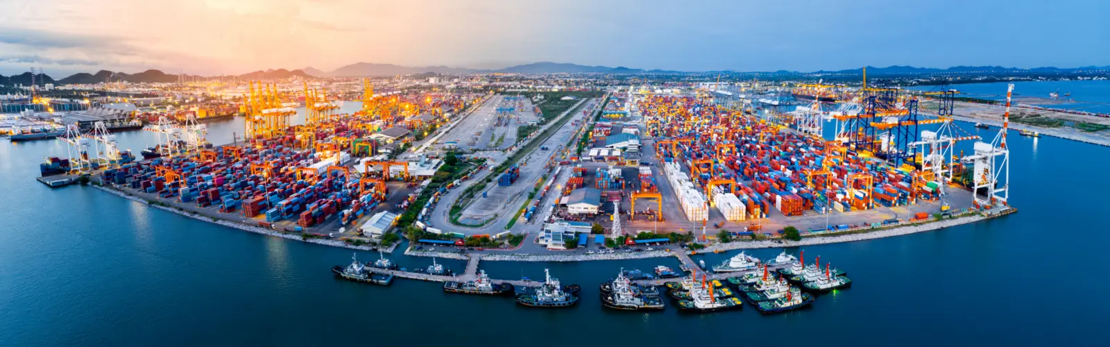 Aerial view of a busy shipping port – highlighting All-Forward’s Ocean Freight Rate Index with daily updates and IOSCO compliance
